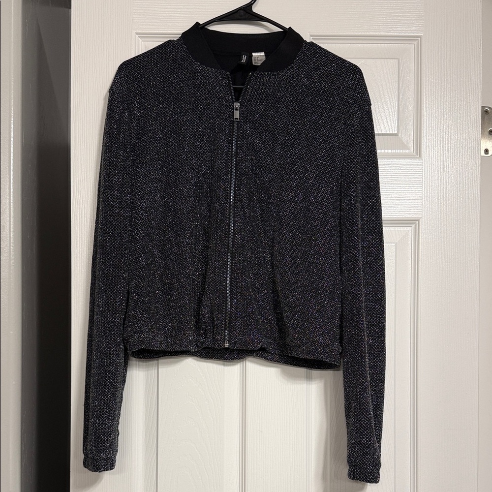 34.  H&M Glittering Black Zip-Up Blazer.